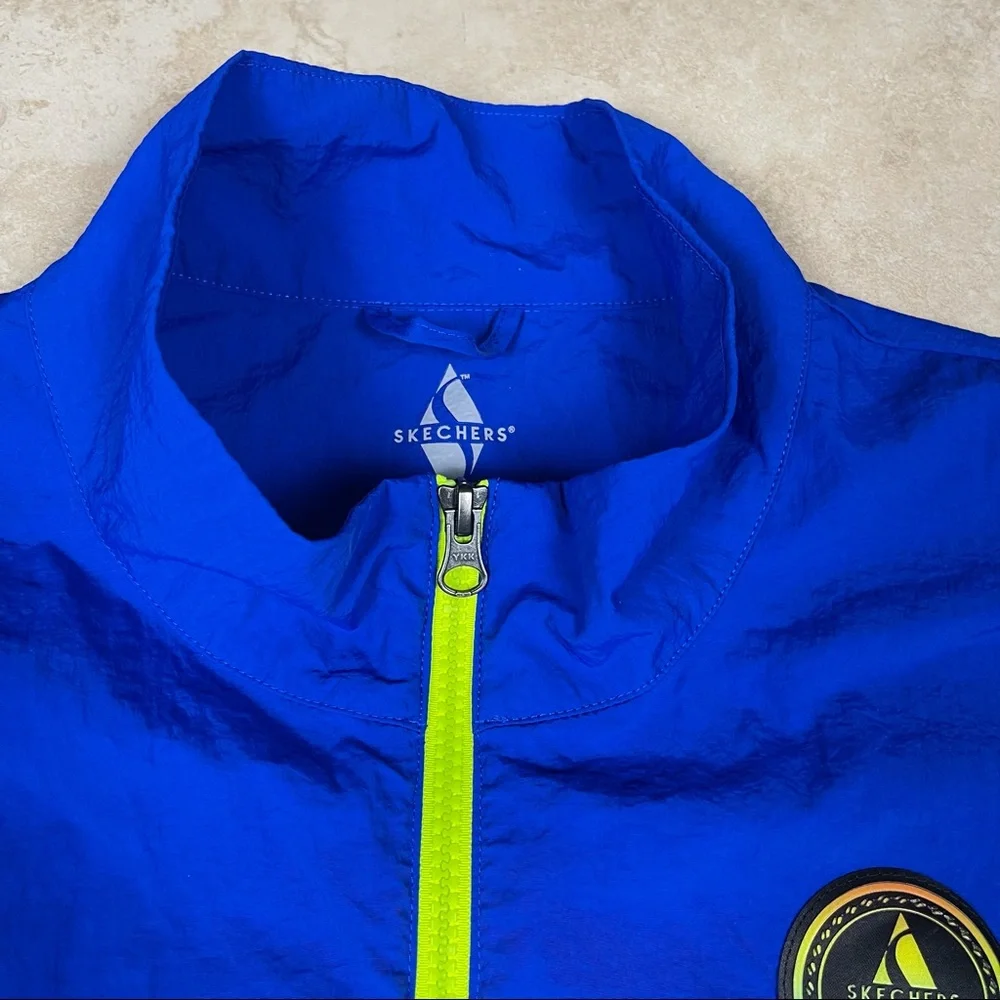 Skechers blue windbreaker